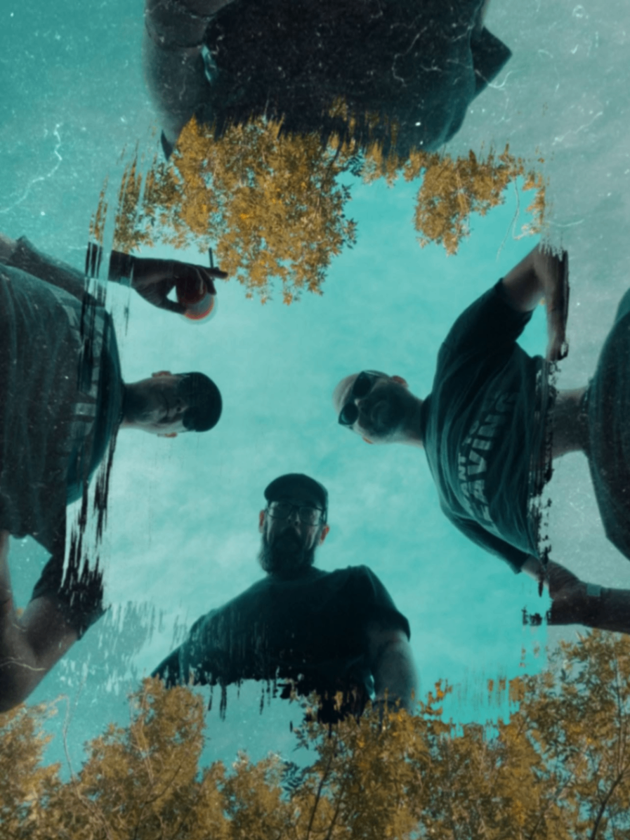 Artistic reflective portrait of Penumbra members outdoors